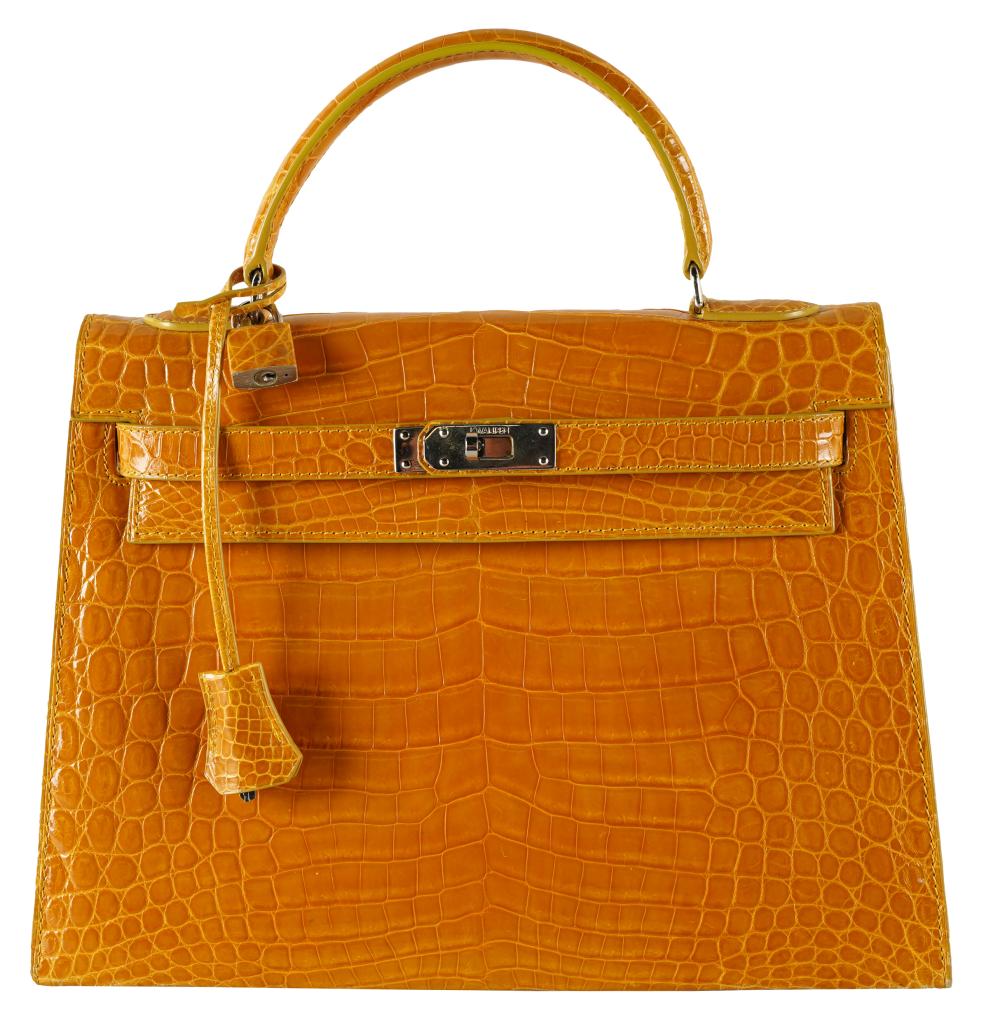 Appraisal: KWANPEN YELLOW LEATHER HANDBAGwith label Provenance Estate from The Wilshire