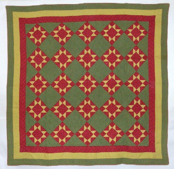 Appraisal: Patchwork quilt Green with red and yellow Red reverse MEASUREMENTS