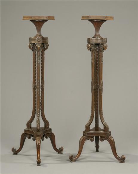 Appraisal: A pair of mahogany torcheres in neo-classical style early th