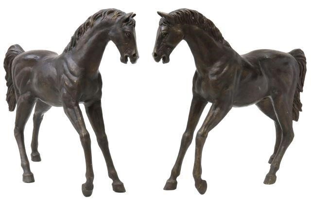 Appraisal: pair Near life-size patinated bronze horse sculptures th c comprising