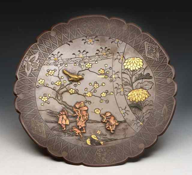 Appraisal: A JAPANESE BRONZE AND INLAID CHARGER having a group of