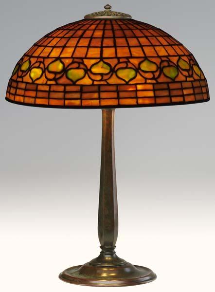 Appraisal: TIFFANY STUDIOS Table lamp with Acorn glass shade in purple