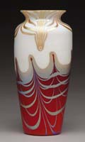 Appraisal: STEUBEN RED AURENE VASE Spectacular iridescent red white and gold