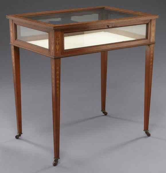 Appraisal: Edwardian inlaid vitrine tablewith marquetry urn and scrolling leaf designs