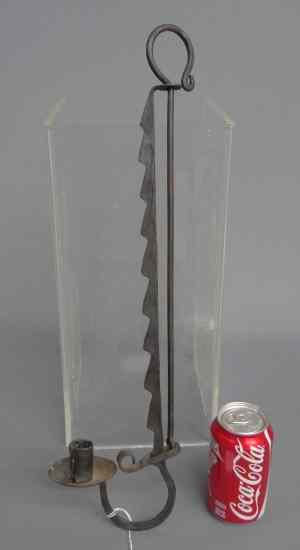 Appraisal: Late th early th c wrought iron single candleholder with