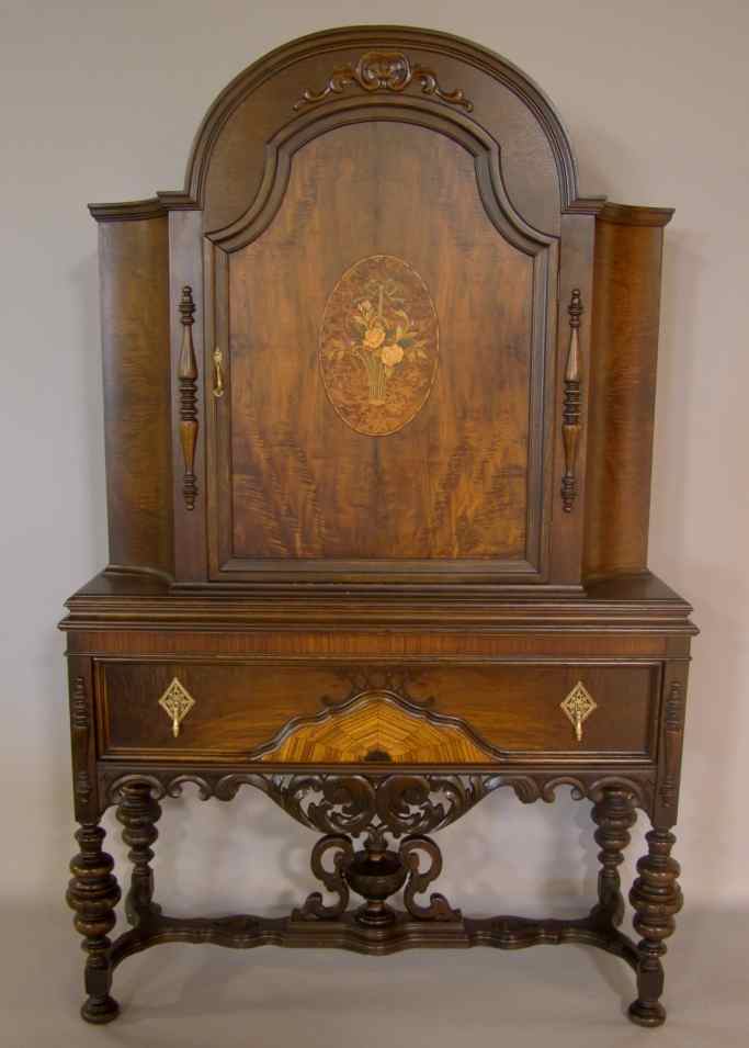 Appraisal: VICTORIAN STYLE INLAID CABINET ON STAND the arched case fitted