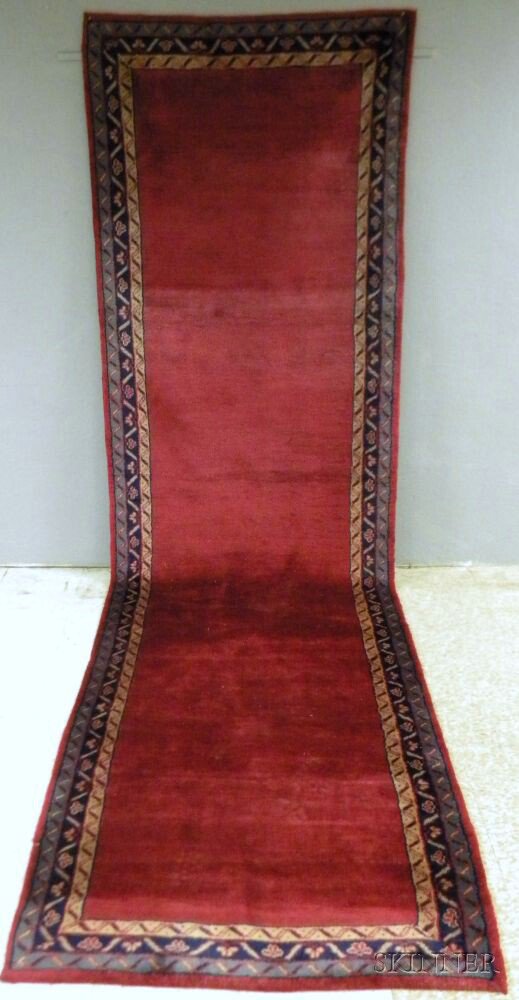 Appraisal: Donegal Long Rug Ireland early th century the empty magenta