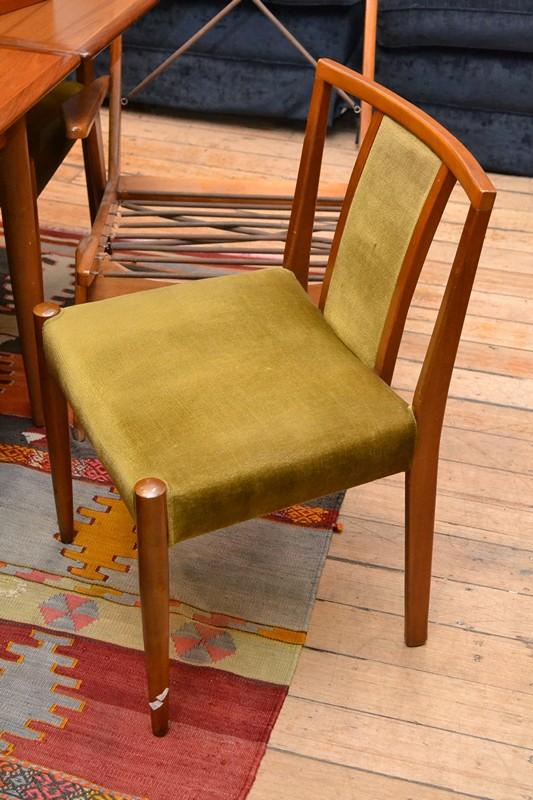 Appraisal: A SET OF FOUR TEAK AND VELOUR CHAIRS IN GREEN