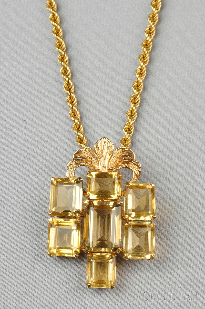 Appraisal: kt Gold and Citrine Pendant Brooch prong-set with seven emerald-cut