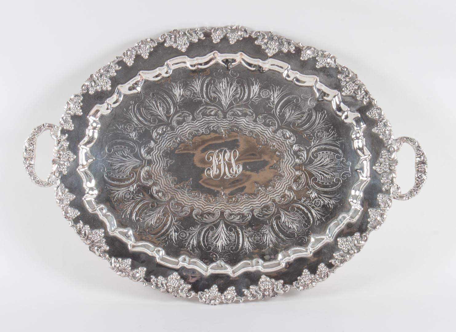 Appraisal: Continental engraved silver-plated oval tea tray x in over handles