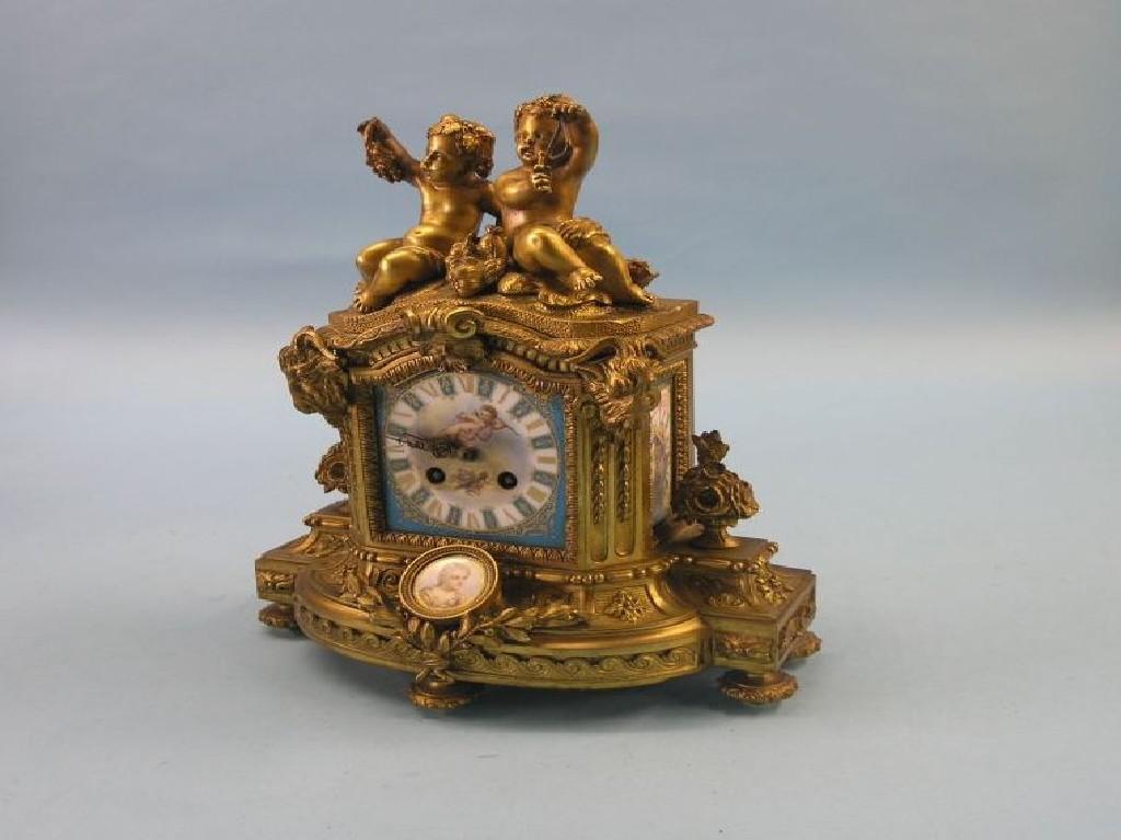 Appraisal: A th century French ormolu mantel clock painted porcelain dial