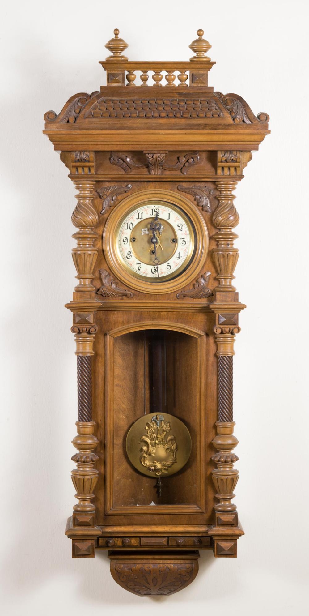 Appraisal: CARVED WALNUT LONG CASE REGULATOR WALL CLOCK Gustav Becker Clock