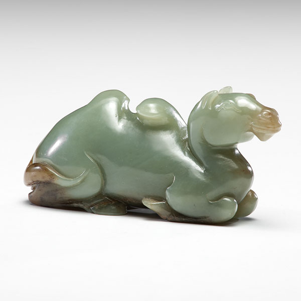 Appraisal: Chinese th century A celadon jade carving of a camel