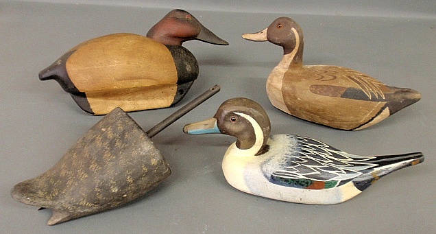 Appraisal: - Four carved wood duck decoys- canvasback x x signed