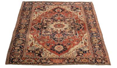 Appraisal: A late th century Serapi carpet North West Persia the