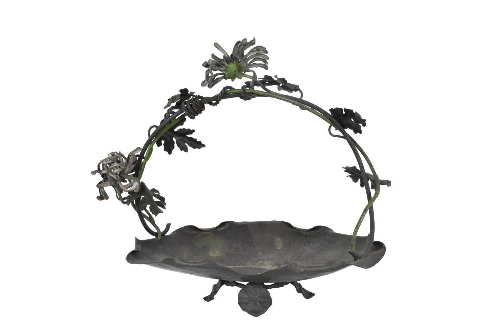 Appraisal: The water lily cast tray with a loop handle entwined