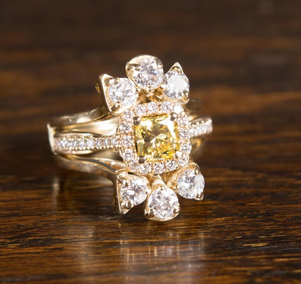 Appraisal: YELLOW DIAMOND AND FOURTEEN KARAT GOLD WEDDING RING ENSEMBLE with