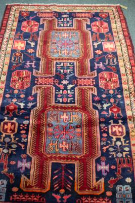 Appraisal: An Ardabil rug with navy ground the geometric floral field