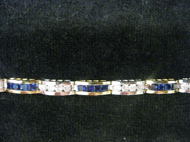 Appraisal: Sapphire Diamond Bracelet alternating round diamonds and square sapphires in