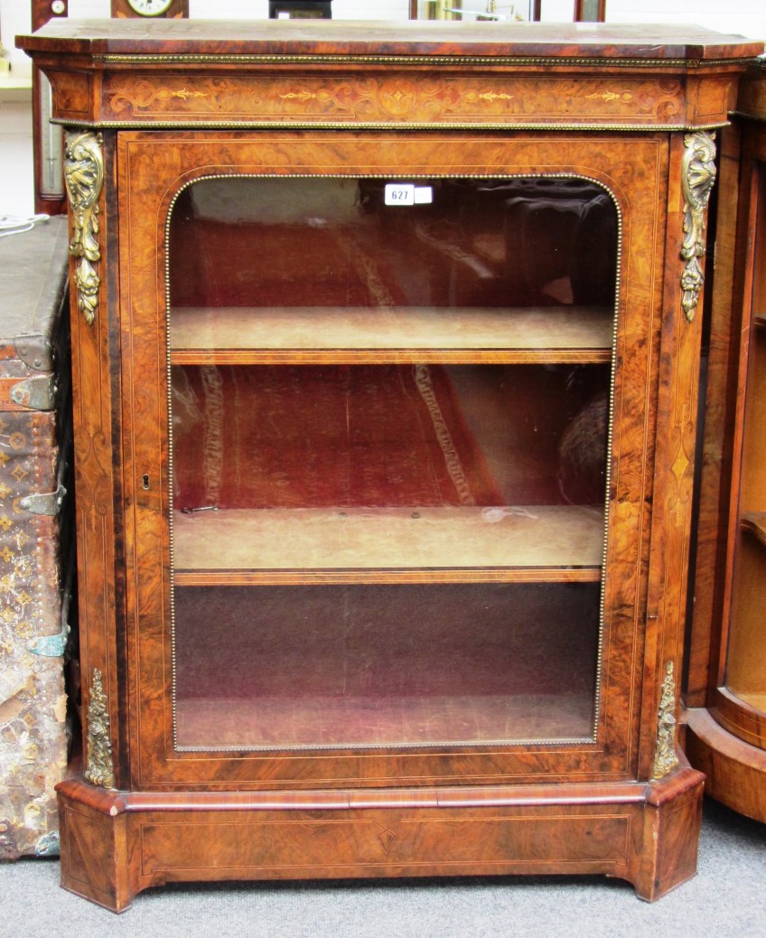 Appraisal: A th century gilt metal mounted figured walnut pier cabinet