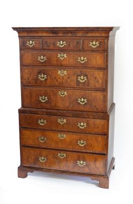 Appraisal: A George II walnut chest on chest the moulded cornice