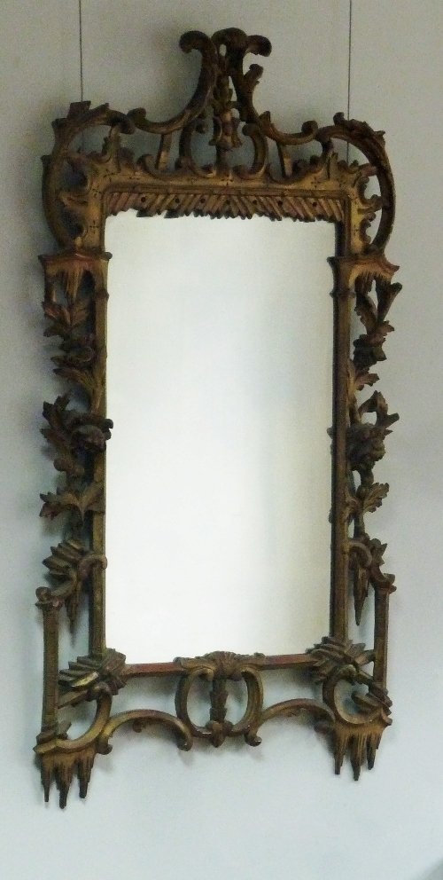 Appraisal: A carved and gilded wall mirror of George III style