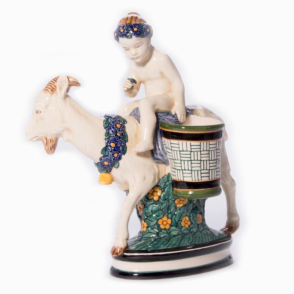 Appraisal: Boy Riding a Goat with on an Oval Pedestal Boy