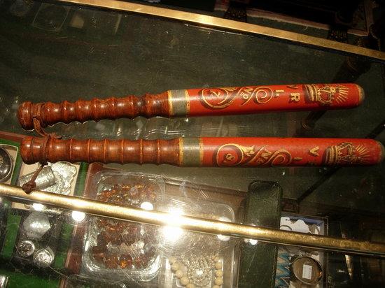 Appraisal: A PAIR OF VICTORIAN TURNED WOODEN POLICEMAN'S TRUNCHEONS with painted