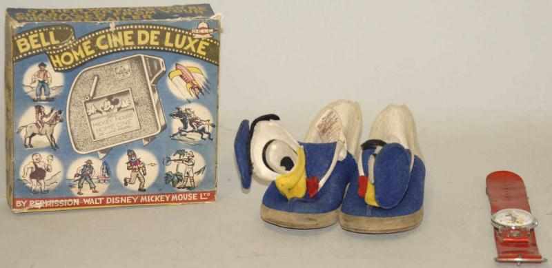 Appraisal: Lot of Disney Character Items Pair of Donald Duck slippers