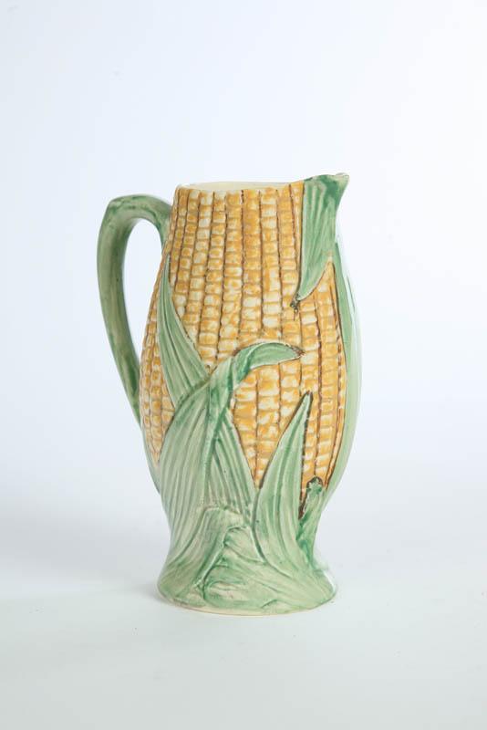 Appraisal: SHORTER MAJOLICA PITCHER In the form of a partially peeled