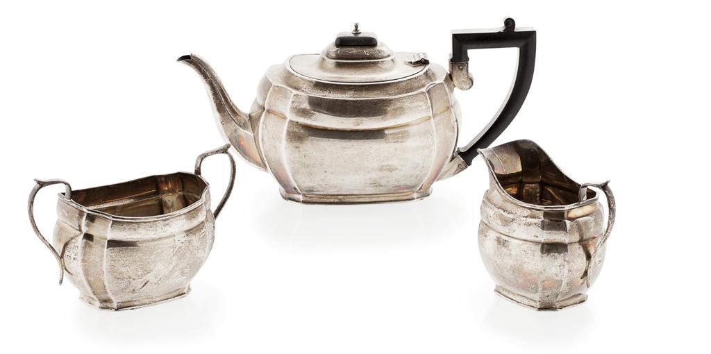 Appraisal: A three piece silver tea set Birmingham of slight rounded