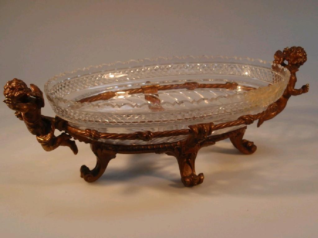 Appraisal: A thC French ormolu oval table centre stand with two