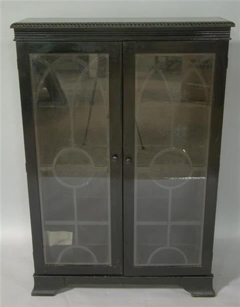 Appraisal: VICTORIAN STYLE BLACK PAINTED WOODEN BOOK CASE WITH GLASS DOORS