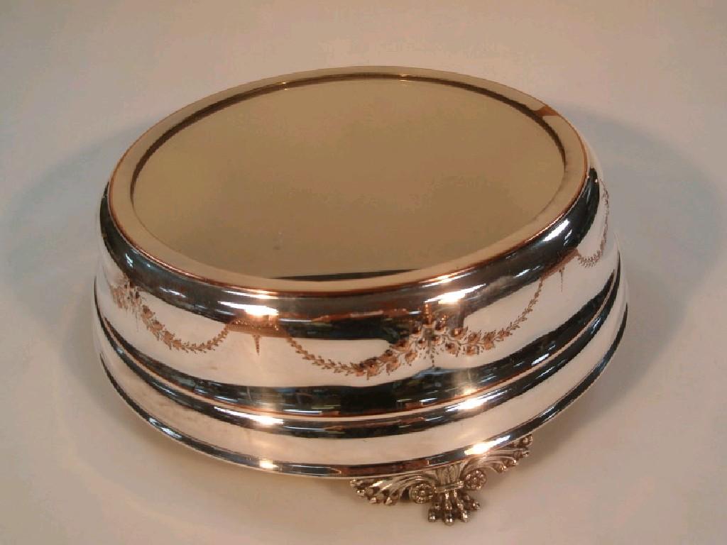 Appraisal: A silver on copper circular cake stand with mirrored surface