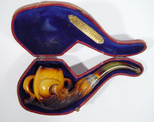 Appraisal: Meerschaum pipe with chased silver collar the bowl carved as