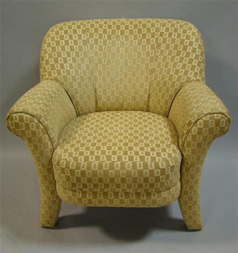 Appraisal: MODERN UPHOLSTERED ARM CHAIR the tight padded back over padded