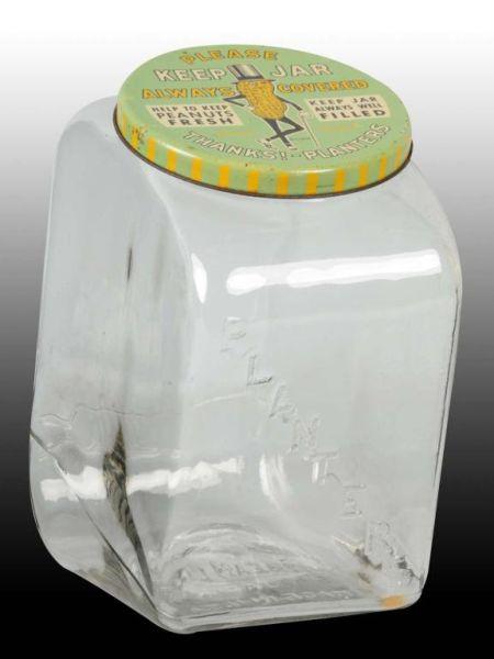 Appraisal: Slanted Glass Planters Peanut Display Jar Description Original tin litho