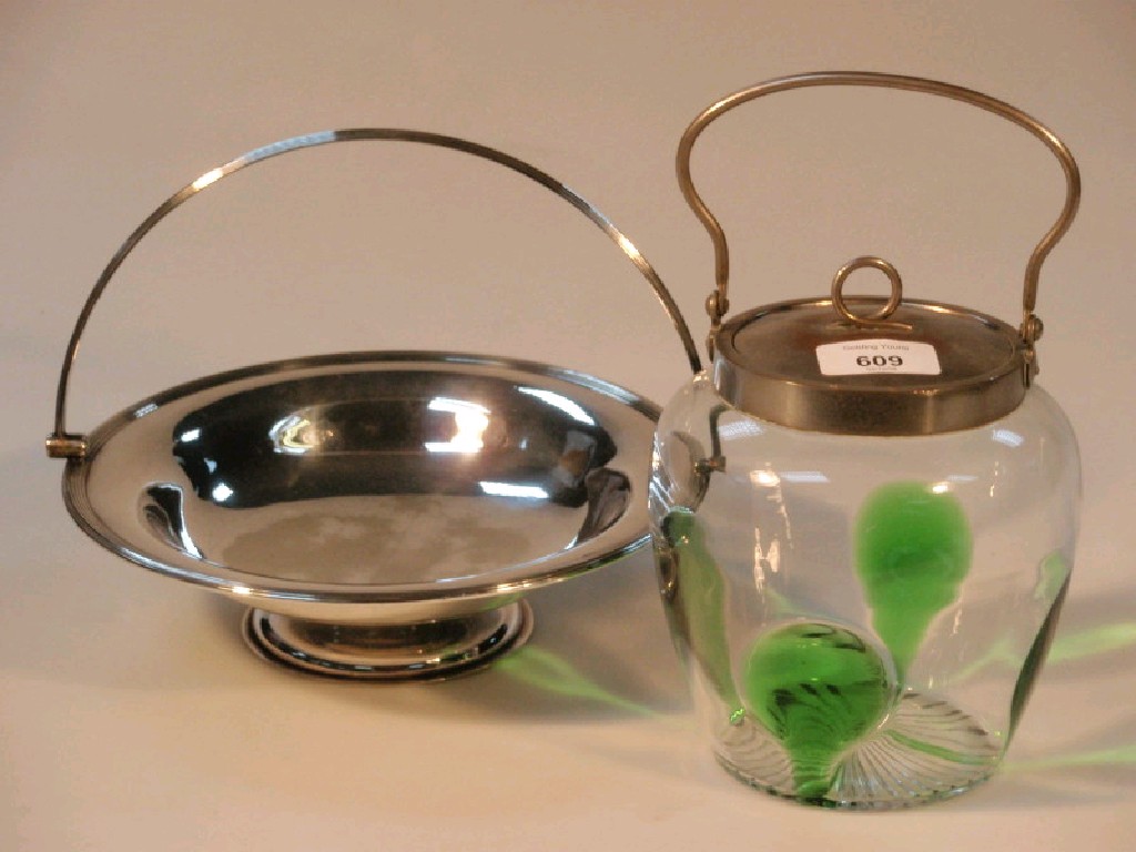 Appraisal: A green and clear flash glass biscuit barrel with electroplate