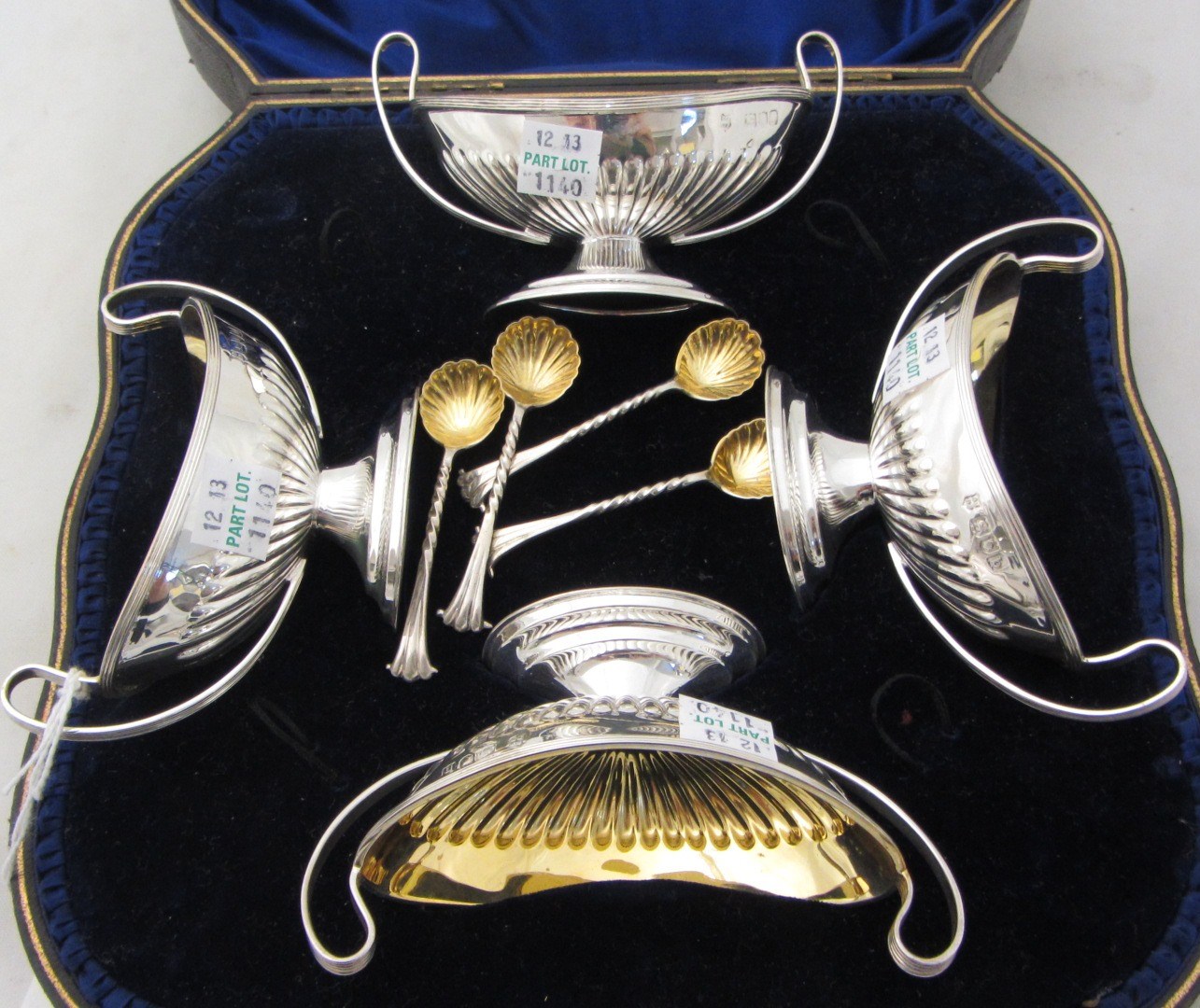 Appraisal: A composite set of three and one silver twin handled