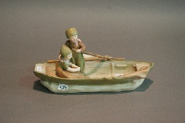 Appraisal: A Royal Dux model of a boat