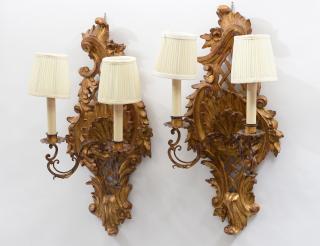 Appraisal: PAIR OF NEO-CLASSICAL STYLE CARVED AND GILTWOOD TWO LIGHT SCONCES