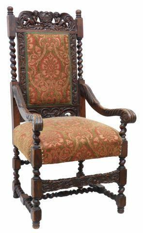 Appraisal: English carved oak armchair th c barley twist stiles topped