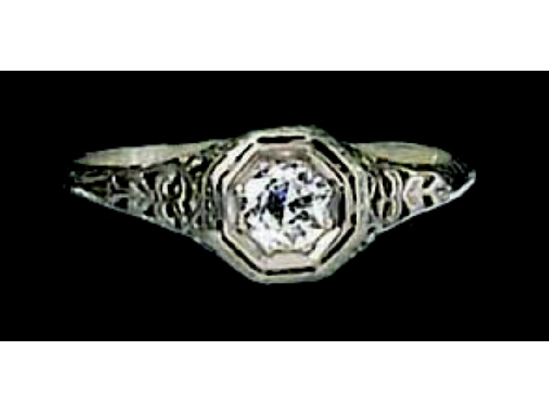 Appraisal: DIAMOND FILIGREE RING White gold solitaire ring set with one