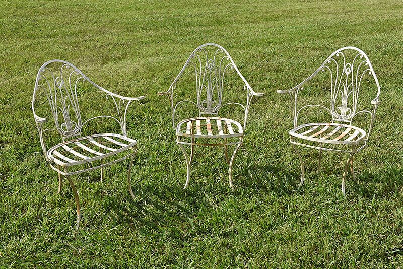 Appraisal: Three Wrought Iron Garden Chairs possibly French early mid th