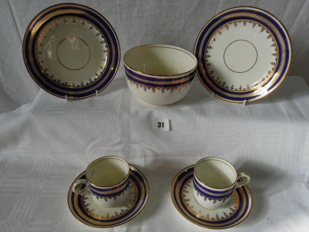 Appraisal: A late th century part tea service with blue and