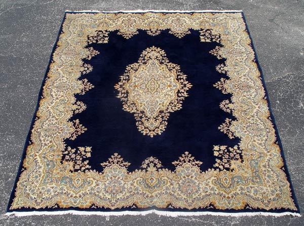 Appraisal: HAND TIED NAVY BLUE KERMAN CARPET Approx ' '' x