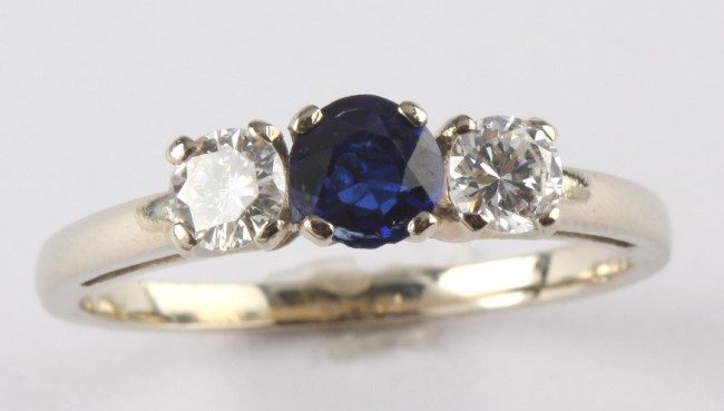 Appraisal: K diamond and sapphire ring One mm sapphire Two mm