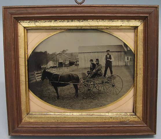 Appraisal: Tintype showing men in horse-drawn buggy housed in period frame