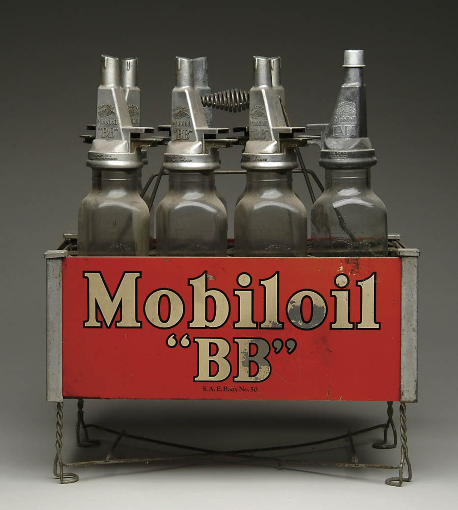 Appraisal: MOBIL OIL GARGOYLE CARRIER WITH BOTTLES Mobil oil BB brand