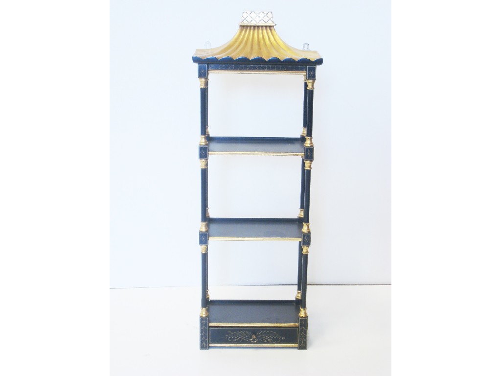 Appraisal: A modern Chinese Chippendale style ebonised and gilt three tier